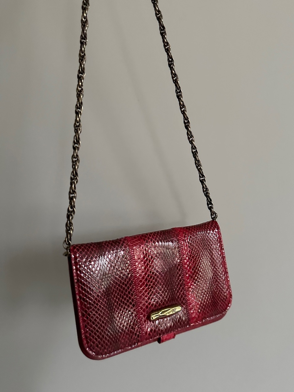 Diane von Furstenberg red snakeskin embossed crossbody clutch bag